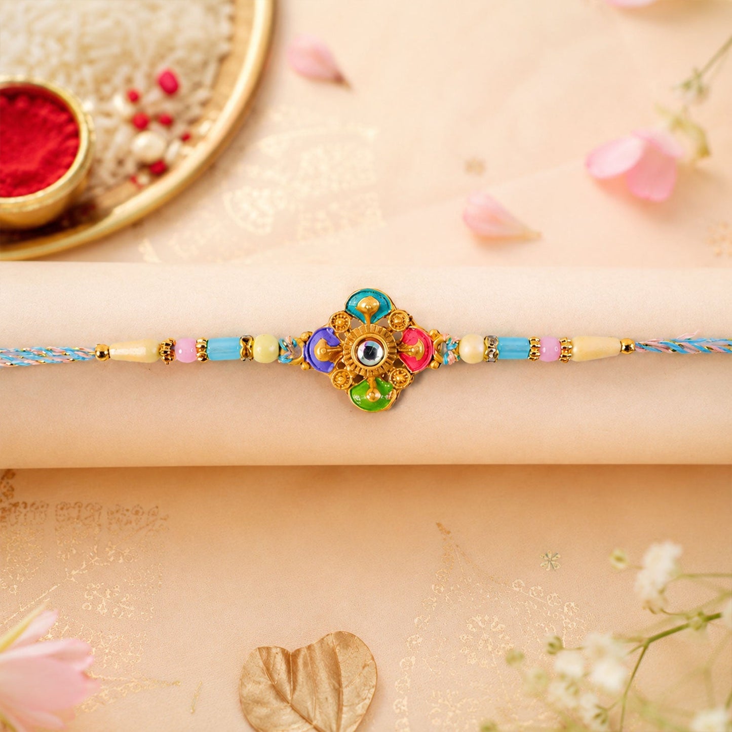 Elegant handmade Rakhi with pastel beads for brother