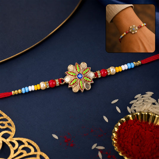 Golden Meenakari floral evil eye Rakhi for brother, beautifully displayed.