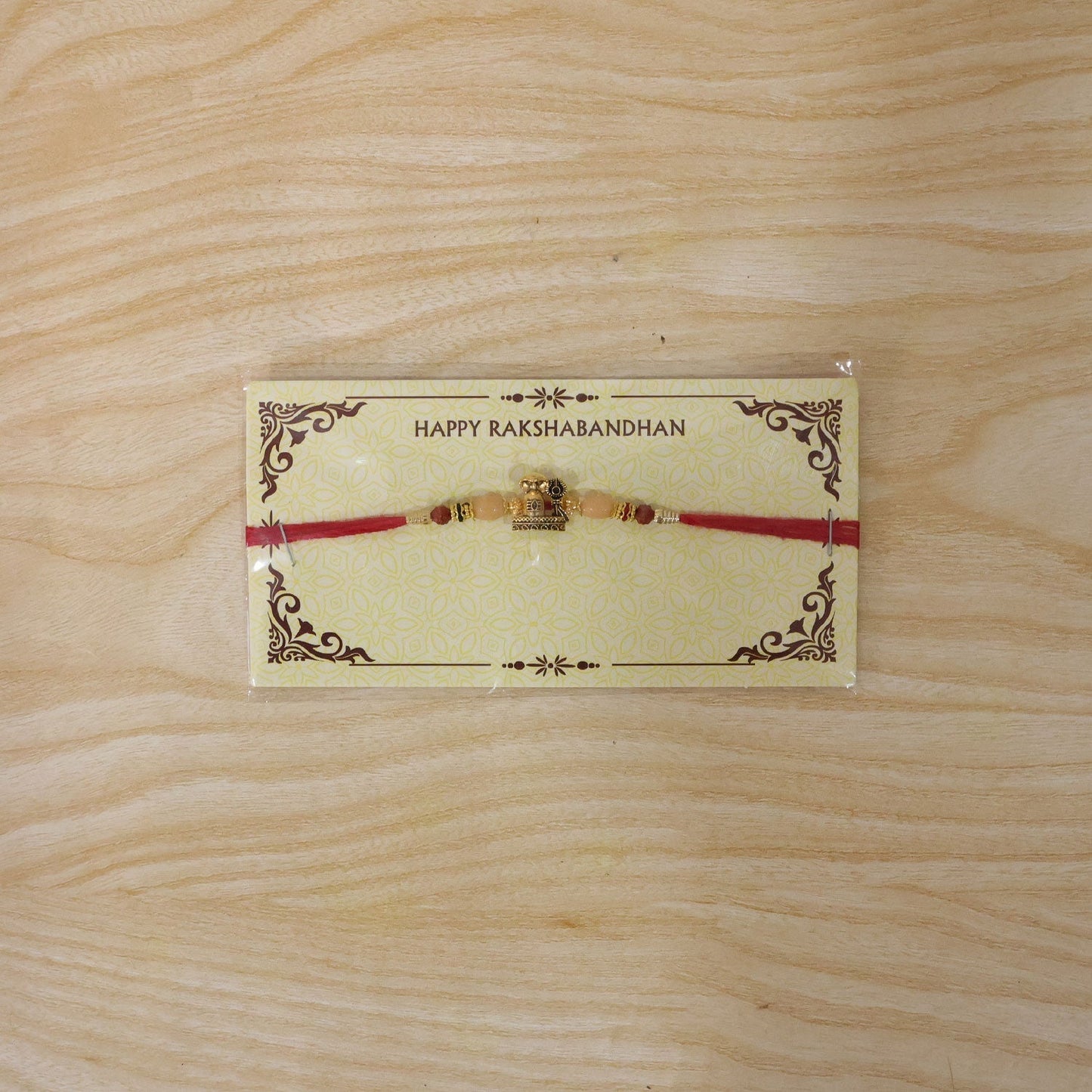 Durable and stylish antique gold Rakhi with Lord Vishnu motif for Rakshabandhan celebration