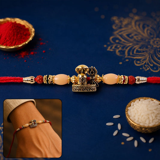 Antique gold Rakhi featuring Lord Vishnu and Rudraksha beads, perfect for Rakshabandhan celebrations
