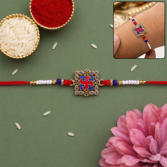 Golden Swastik meenakari Rakhi with crystal beads, perfect for brother Raksha Bandhan celebration