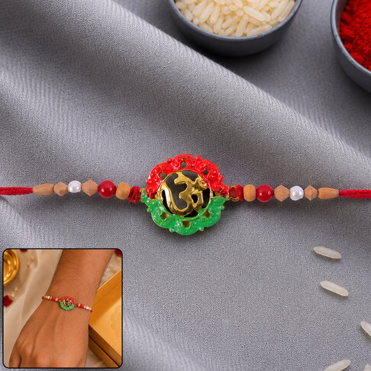 Elegant Sacred Om Meenakari Rakhi with pearl beads for Rakshan Bandhan