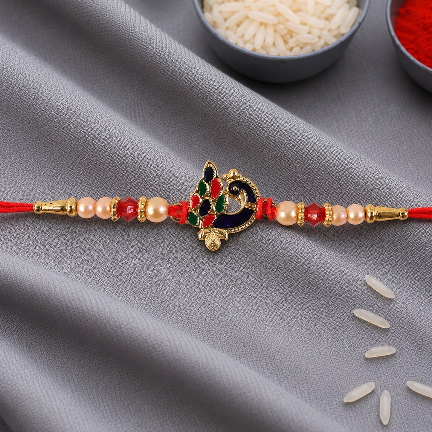 Beautifully crafted Blue Meenakari Peacock Rakhi for brothers