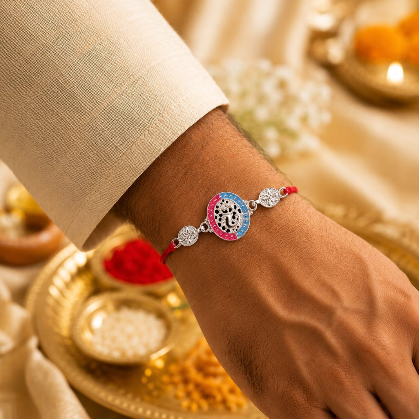Close-up of Silver Meenakari Rakhi showing intricate enamel work and premium silver finish