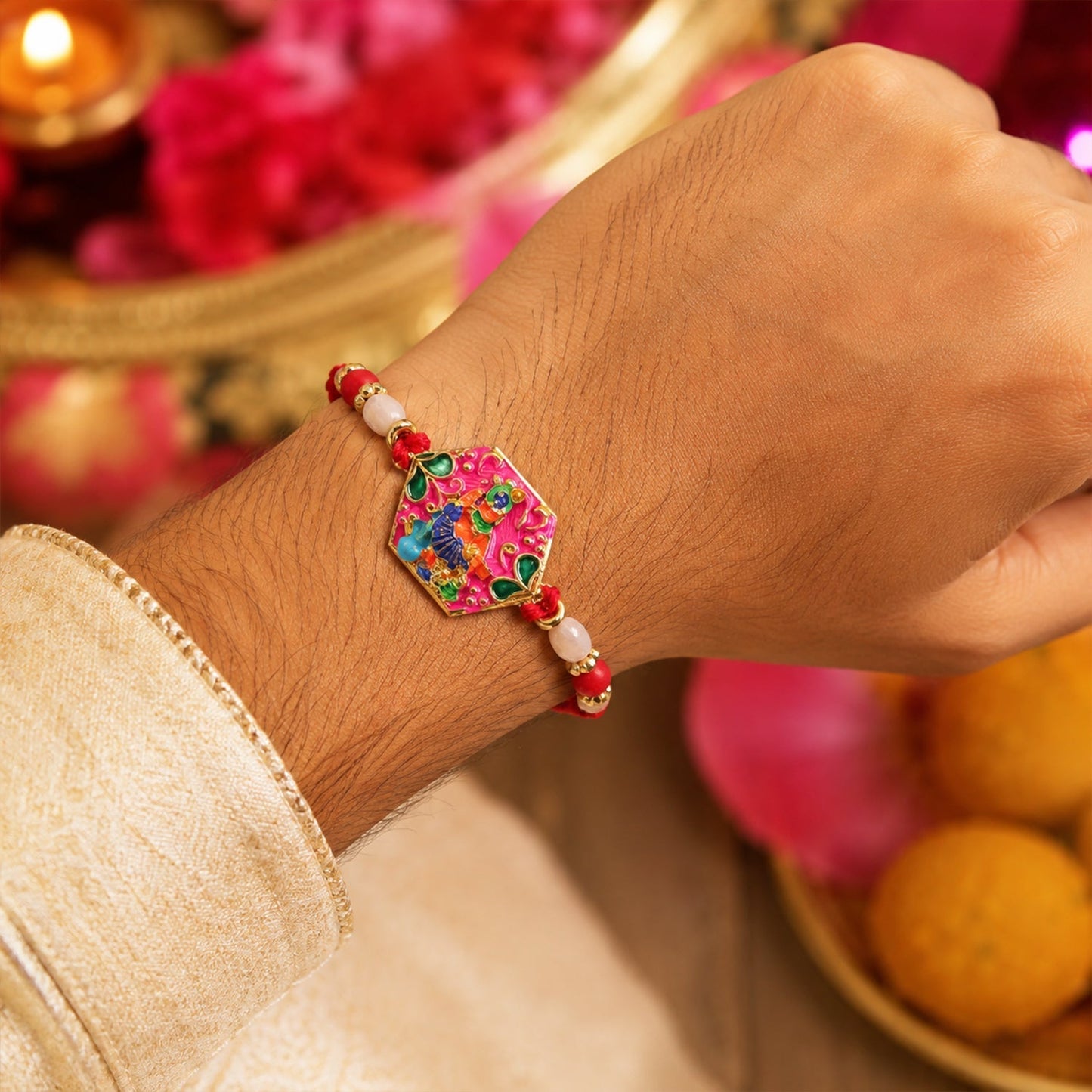 Multicolor enamel rakhi on white background showcasing festive colors