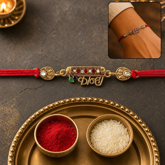 Close-up of Kanha Black Enamel Gold Tone Rakhi showing intricate design