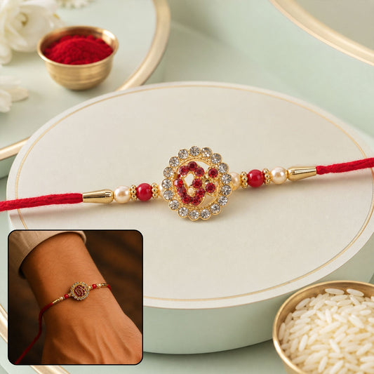 Front view of Om stone studded gold-tone Rakhi, perfect for Raksha Bandhan