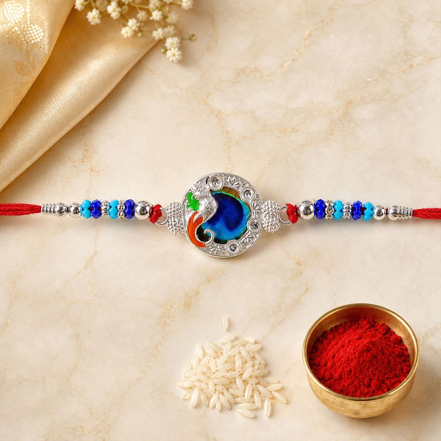 Festive Rakhi with peacock motif, ideal for gifting during Raksha Bandhan.