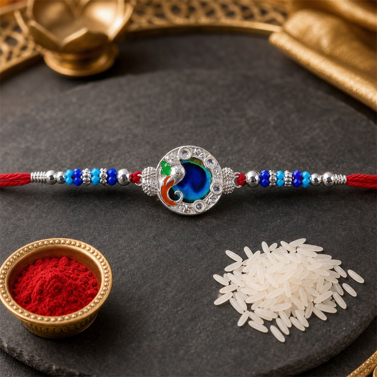 Close-up of Peacock Blue Stone Rakhi showcasing detailed craftsmanship.