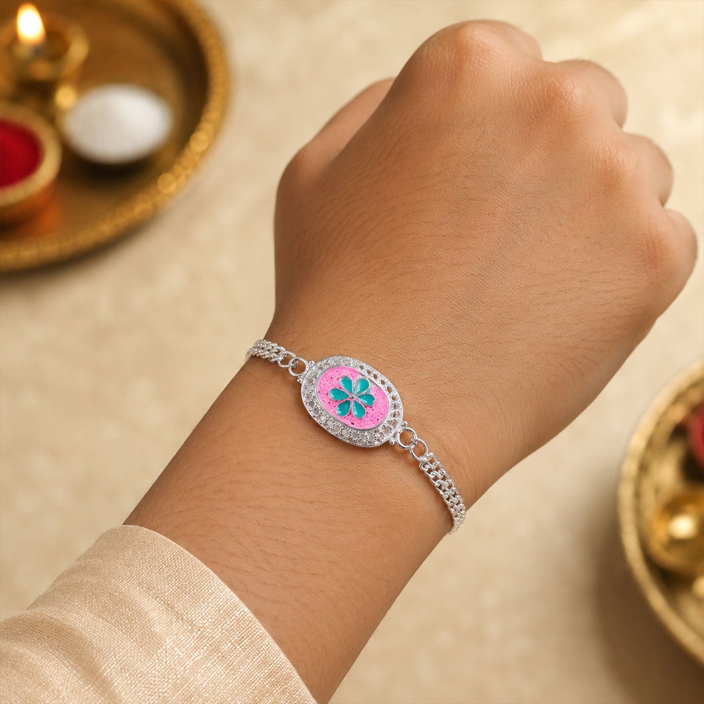Detailed view of Silver floral Rakhi with elegant design