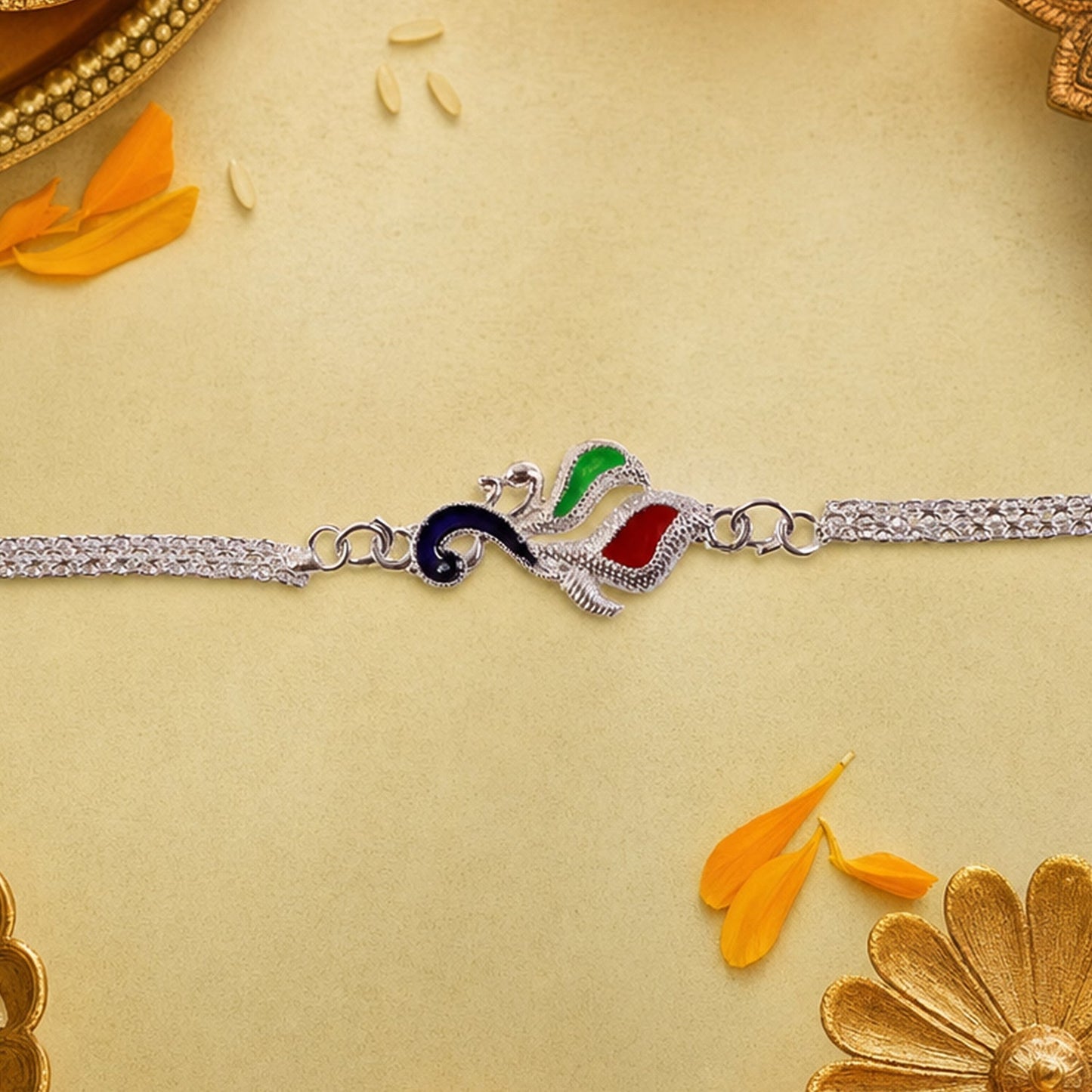 Premium enamel Silver Peacock Rakhi with attractive design for brother