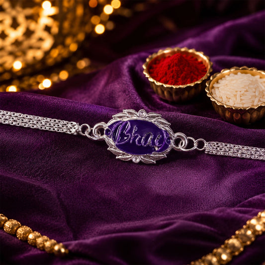 Close-up of a Silver Rakhi with intricate design, perfect for Rakshabandhan.