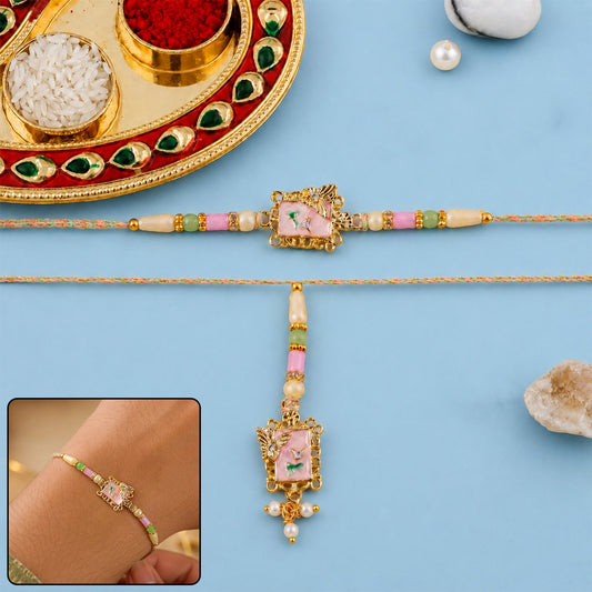Close-up of pink floral design with kundan and pearls on traditional Rakhi.