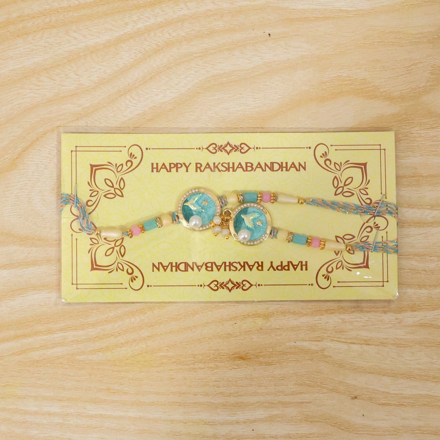 Elegant Blue Floral Kundan Pearls Lumba Rakhi with modern traditional style.