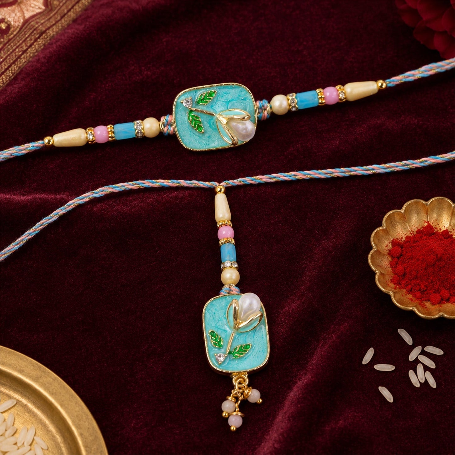 Beautiful embroidery and beadwork on Teal Stone Pearl Rakhi