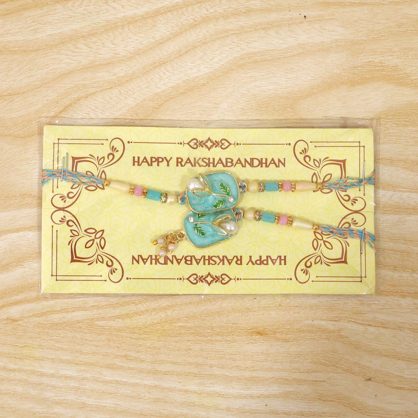 Elegant design of Teal Stone Pearl Rakhi for festival