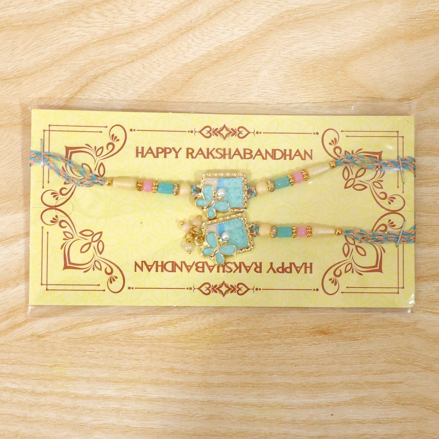 Wrist showcasing detailed design of Turquoise floral Lumba Rakhi