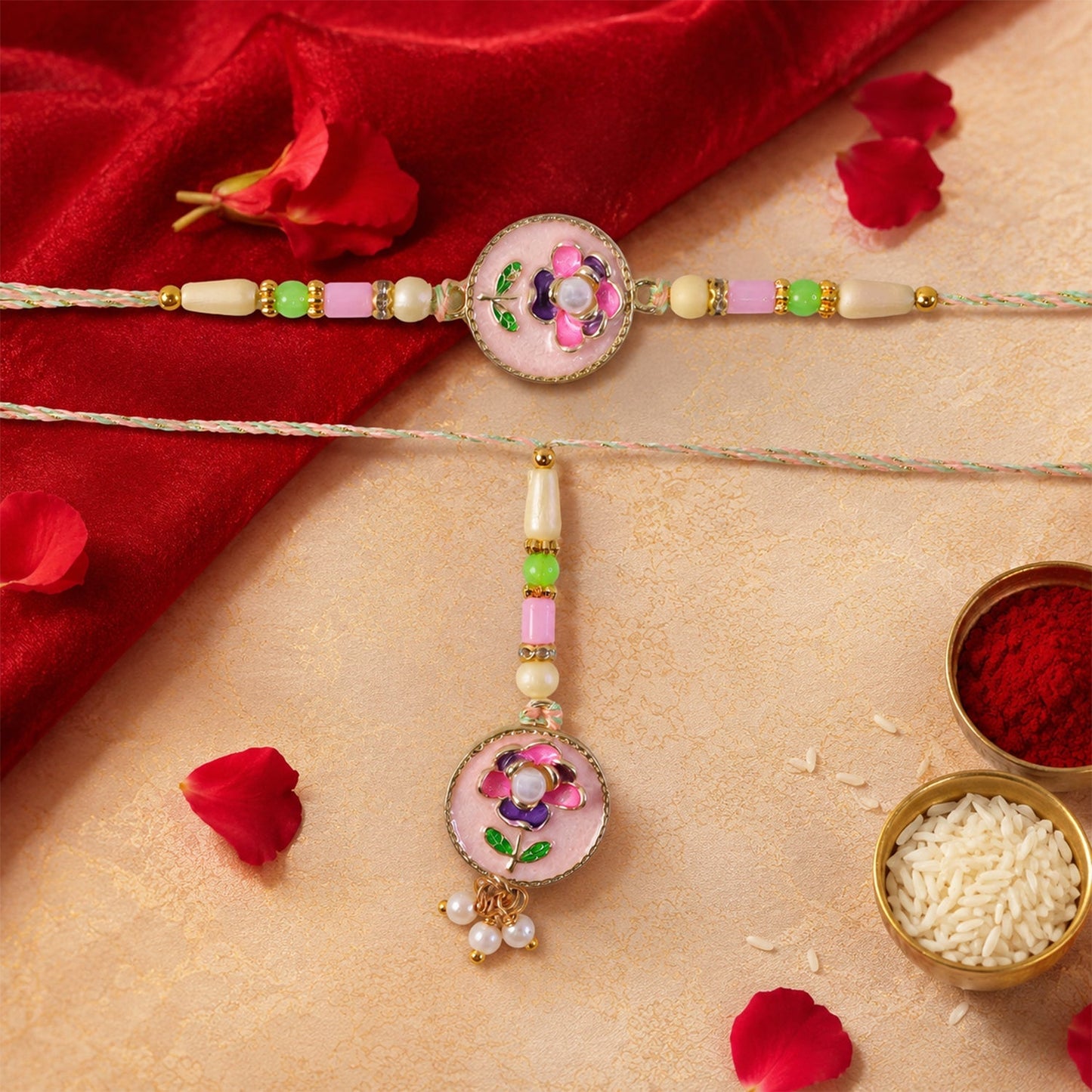 Stylish pink floral Rakhi featuring pearls and kundan accents