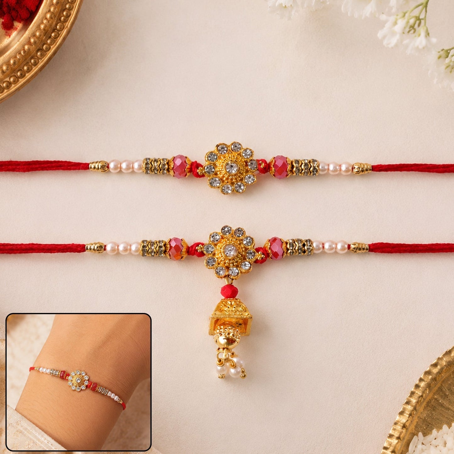 Close-up of the diamond flower golden-tone pearl bead rakhi with intricate design