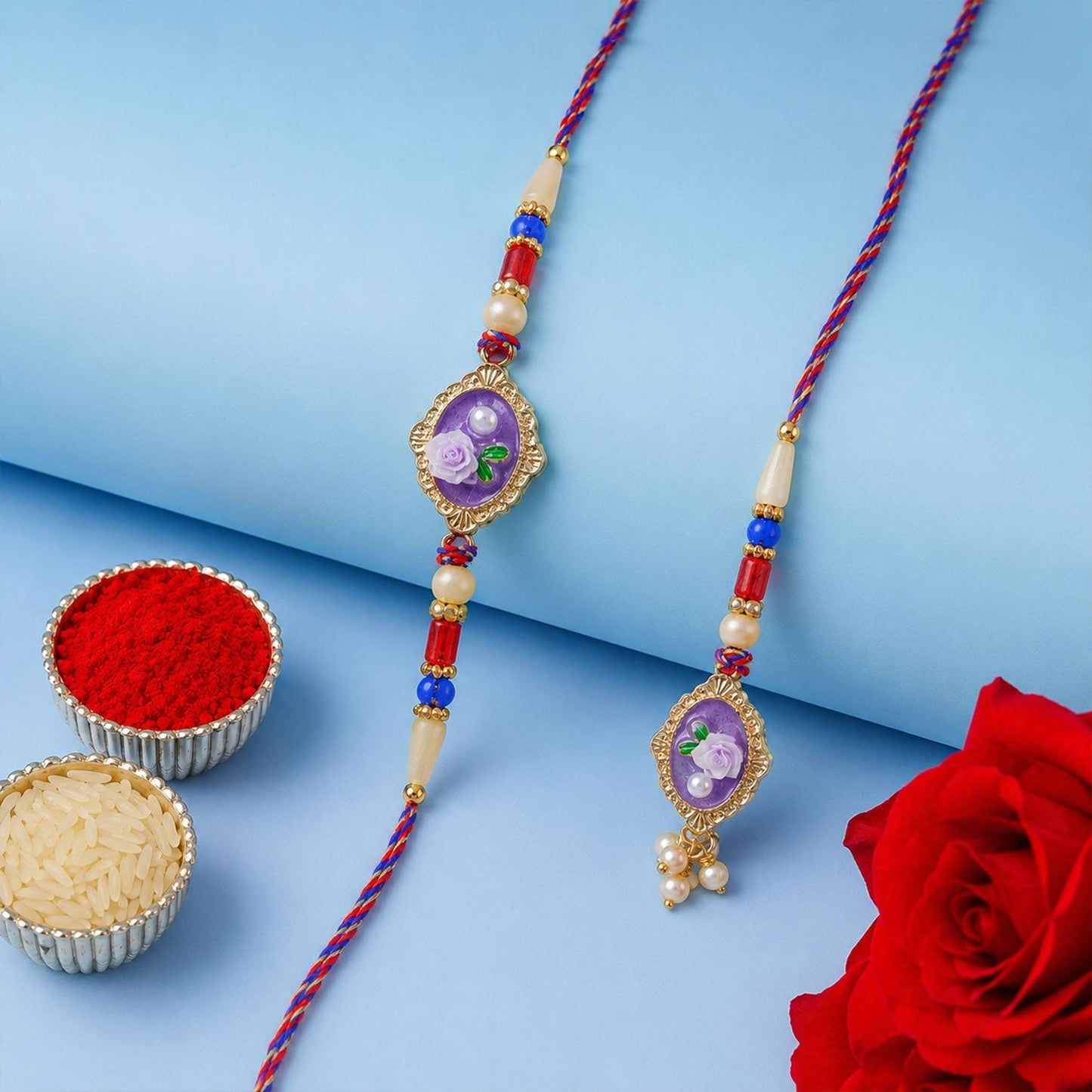 Festive Bhaiya Bhabhi Rakhi with rose enamel and pearl beads for Raksha Bandhan