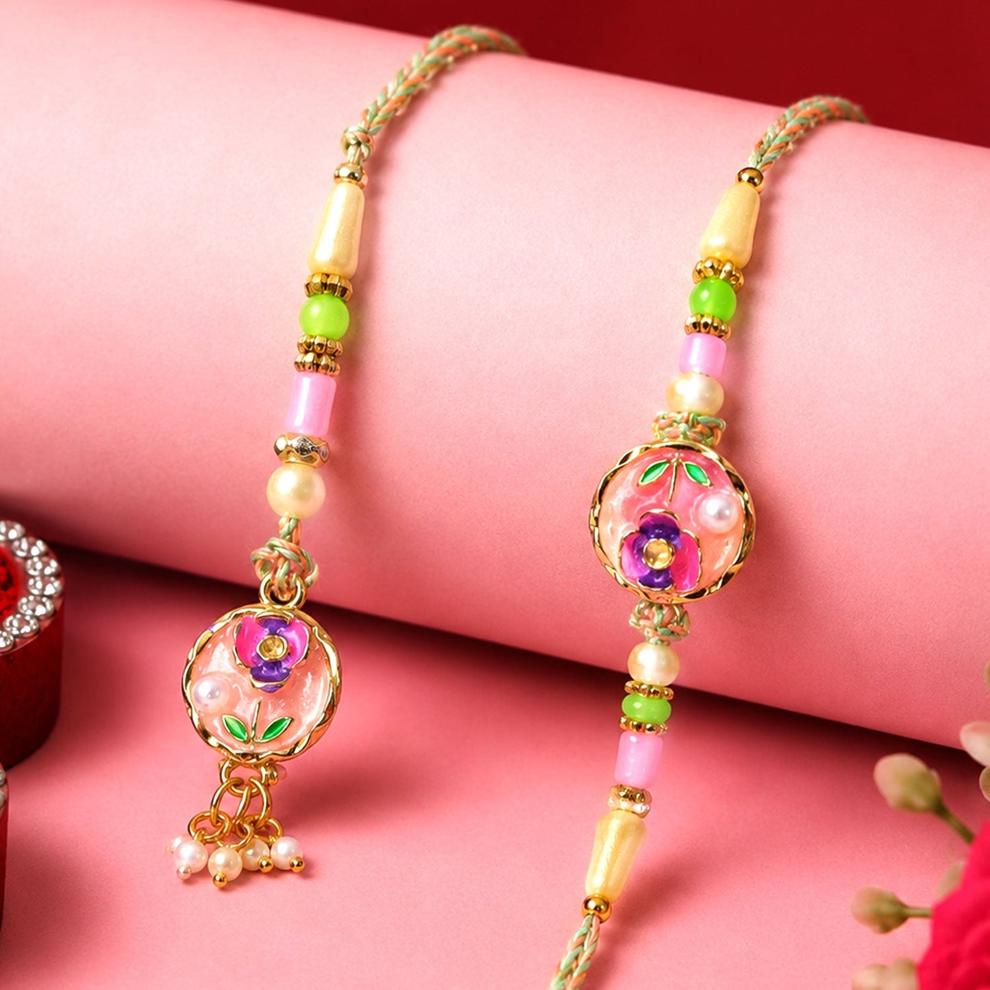 Elegant floral pearl Bead Rakhi design for sibling celebration