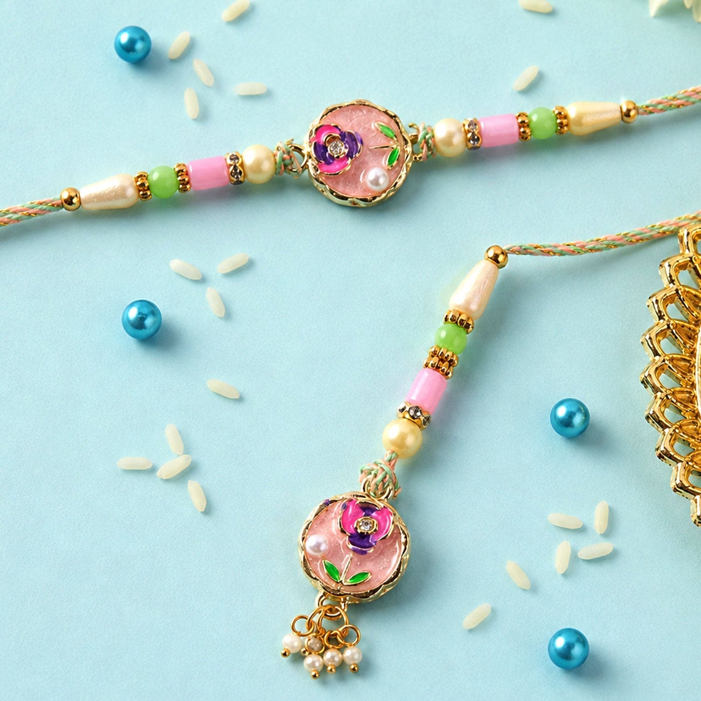 Beautiful traditional Rakhi with enamel floral charm and pearl beads
