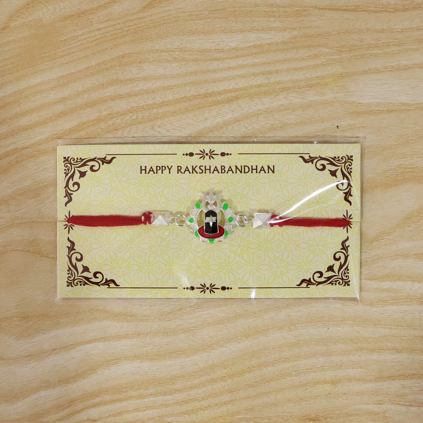 Multiple Silver Shiv Lingam Trishul Rakhis ready for gifting during Raksha Bandhan