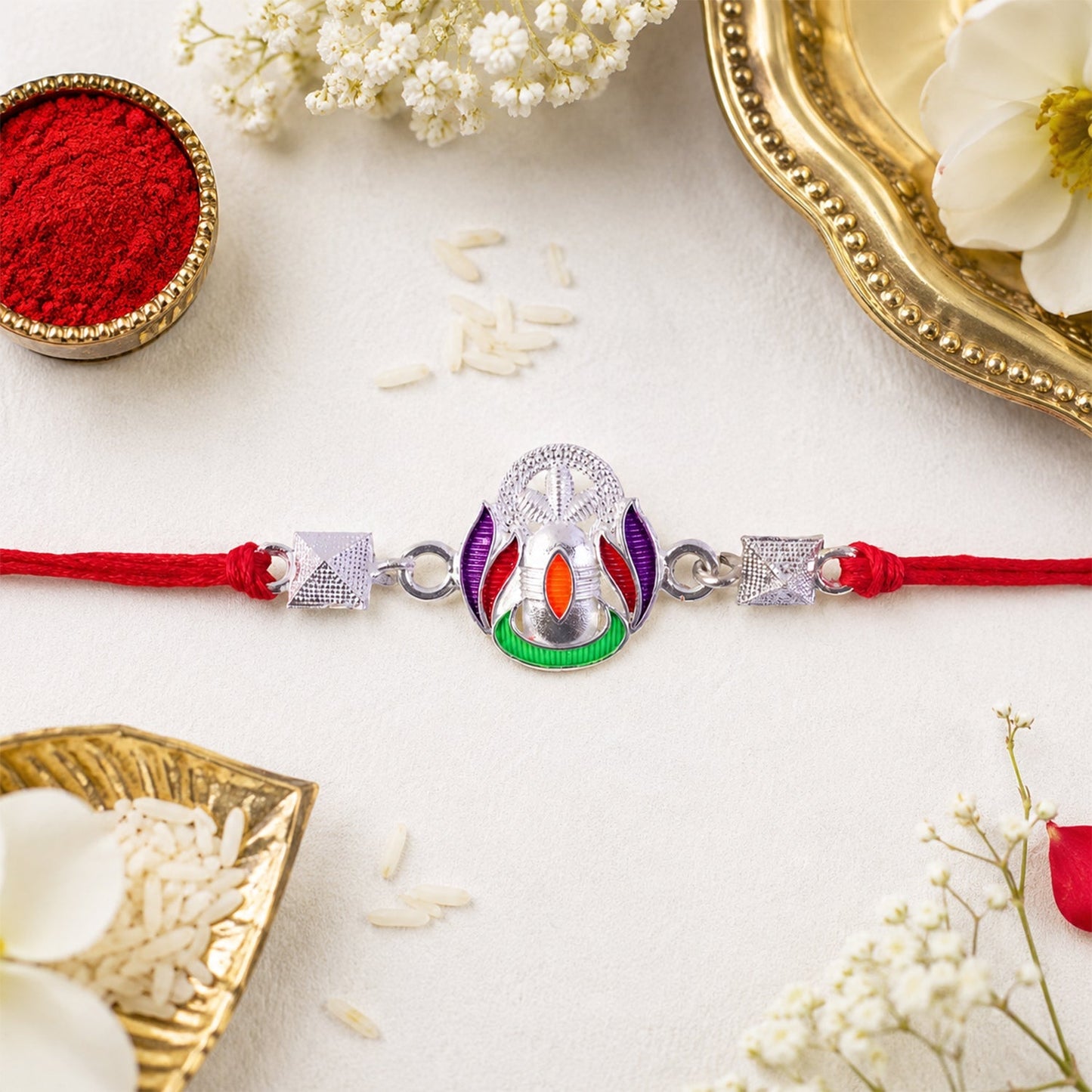 Silver Shivling Rakhi with multicolor enamel and silver beads, traditional festival gift