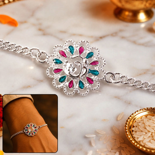 Close-up of Silver floral Om enamel chain bracelet for Rakhi