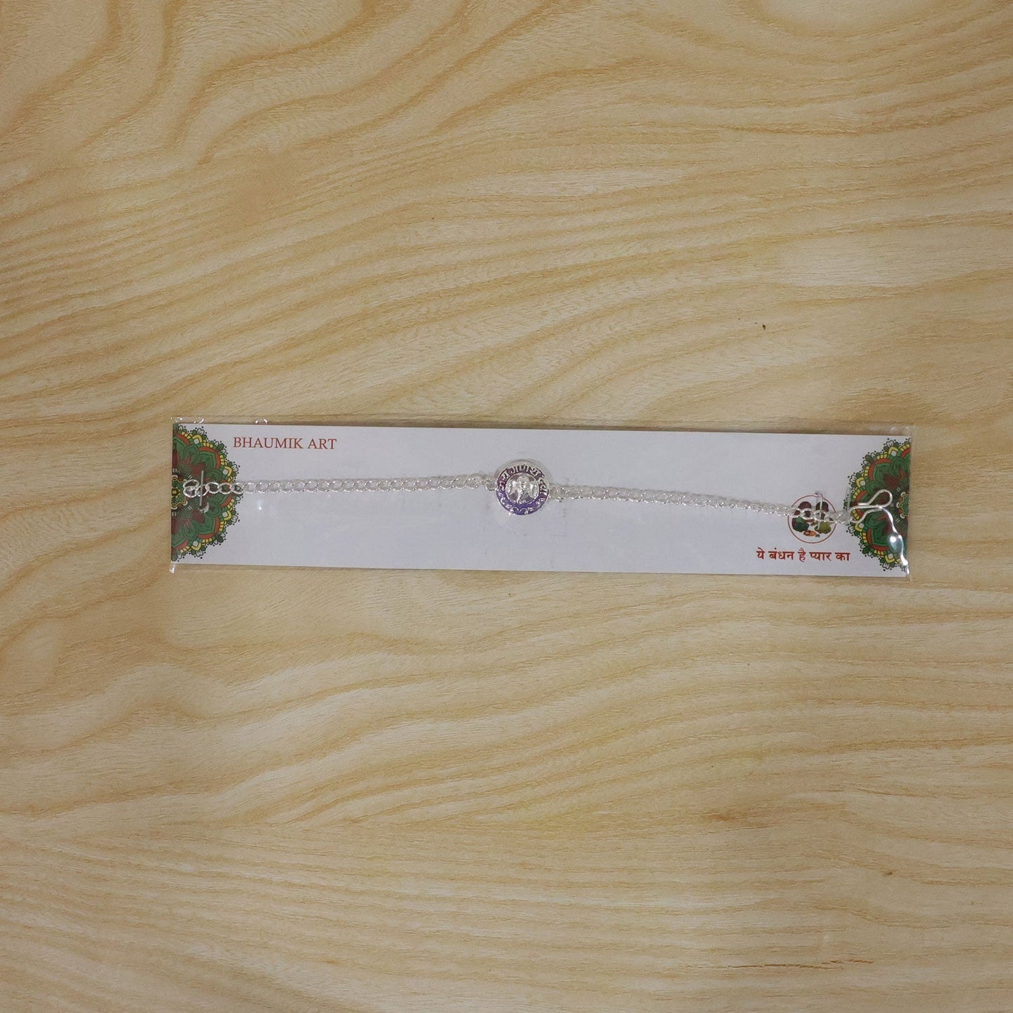 Detailed view of silver Ganesha enamel bracelet showcasing craftsmanship