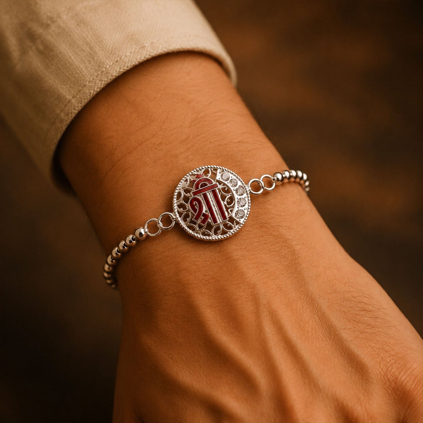 Decorative Silver Enamel Stone Rakhi with vibrant colors, suitable for Raksha Bandhan