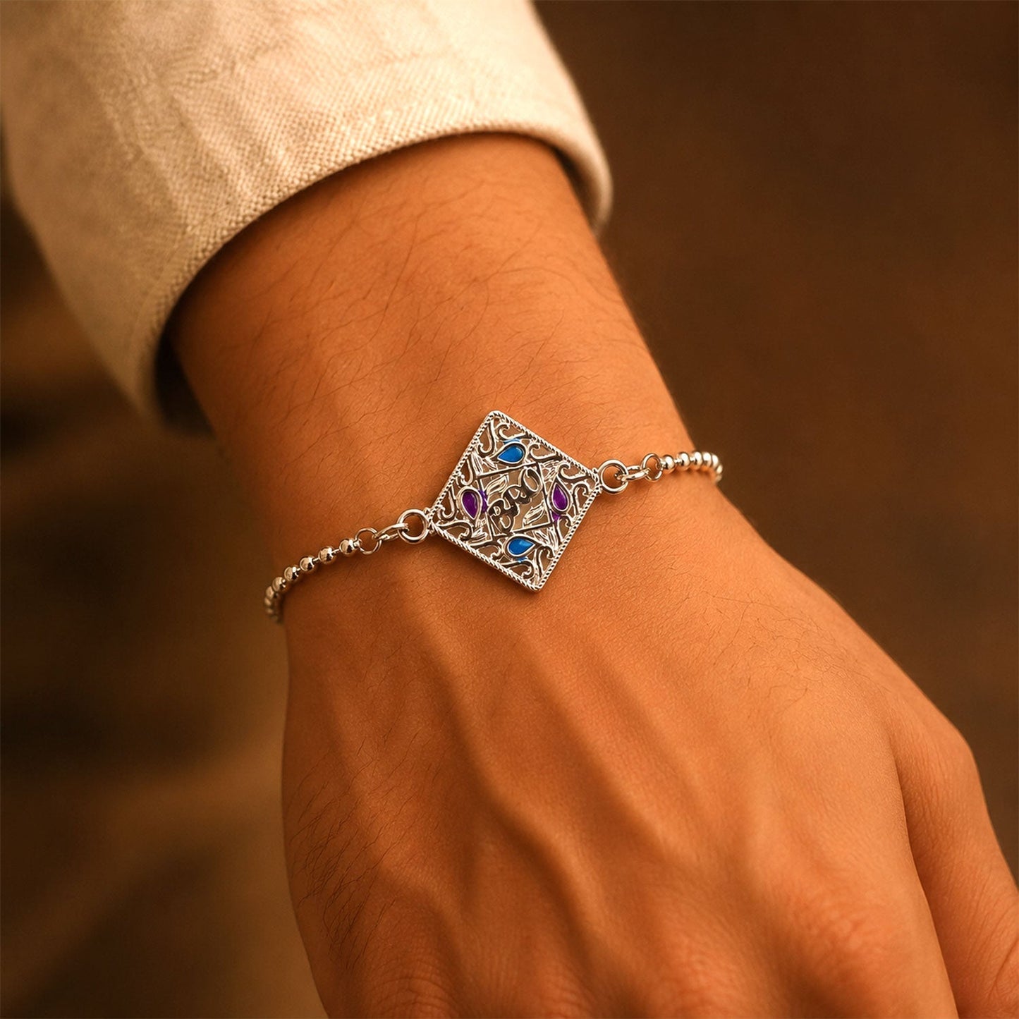 Elegant silver bracelet with bro text and enamel details, perfect festival accessory