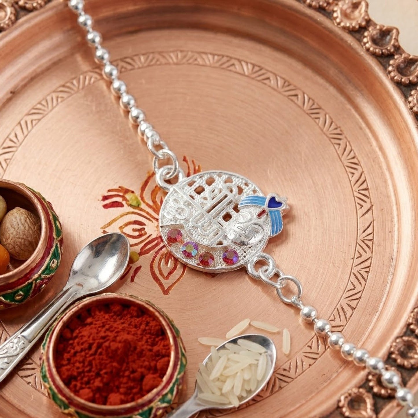 Stylish brother's Rakhi featuring a round frame with stones
