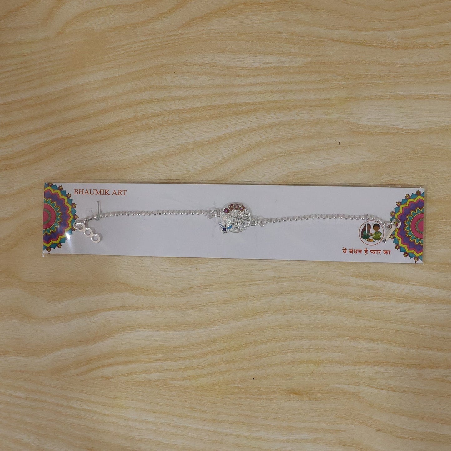 Beautifully crafted Rakhi with stone embellishments for the Raksha Bandhan festival