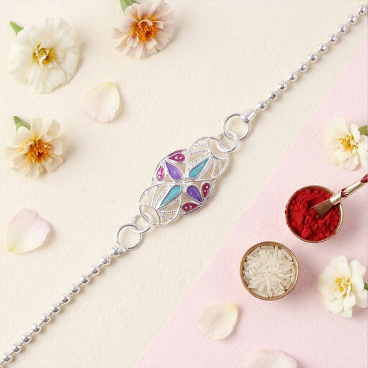Beautiful oval enamel stone charm chain bracelet rakhi for brother, perfect for Raksha Bandhan celebrations.