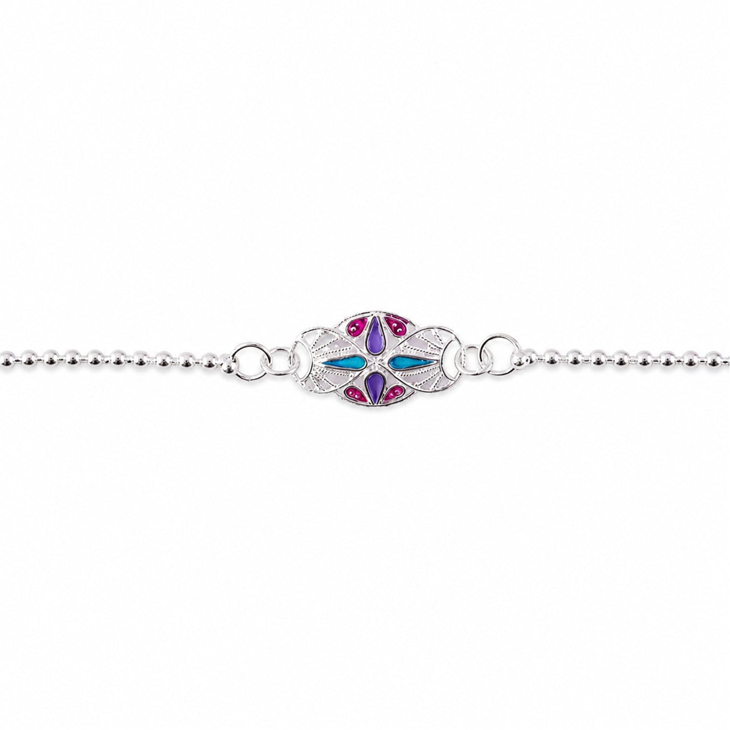 Stylish and traditional rakhi with enamel-coated stone charm, perfect for brother-sister bond.
