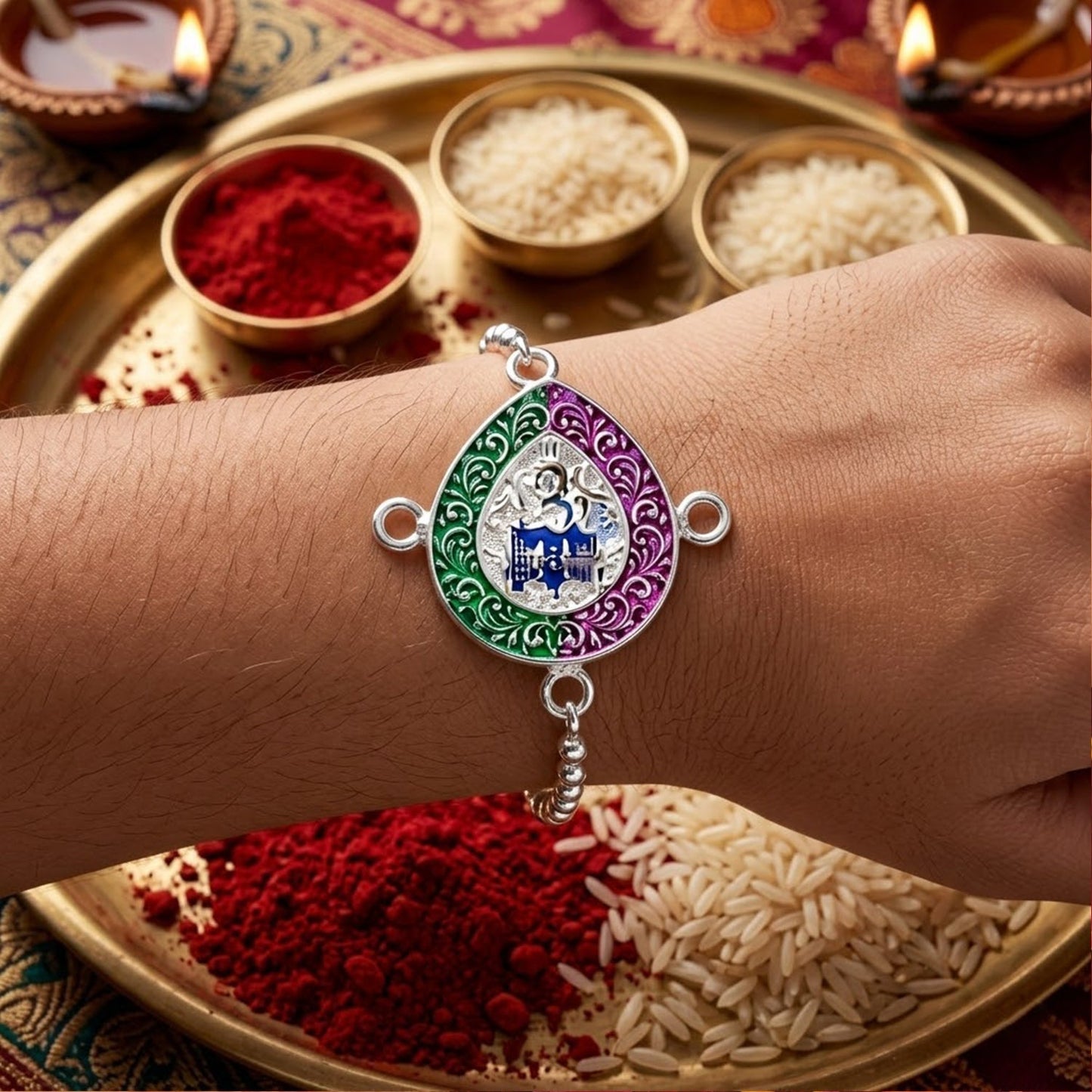 Elegant design of enamel Damaru charm chain bracelet rakhi for brother