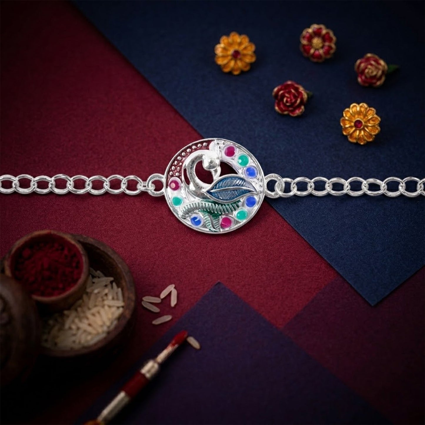 Elegant peacock enamel and stone chain rakhi displayed for festive gifting