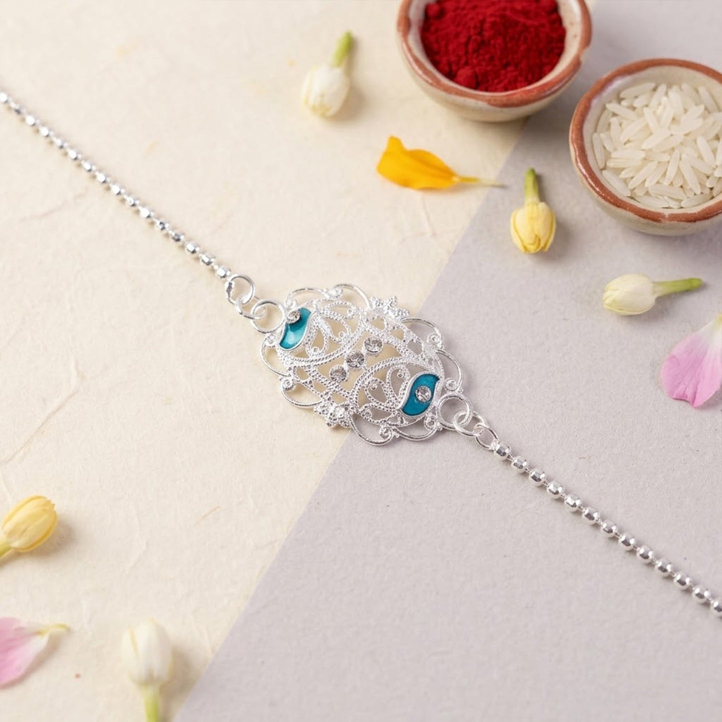 Premium quality Rakhi with enamel charm, suitable for all ages