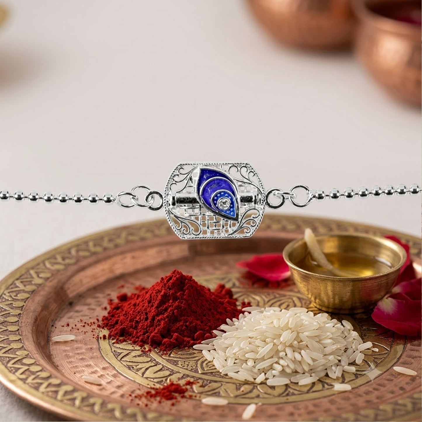 Vibrant enamel peacock Rakhi suitable for Raksha Bandhan
