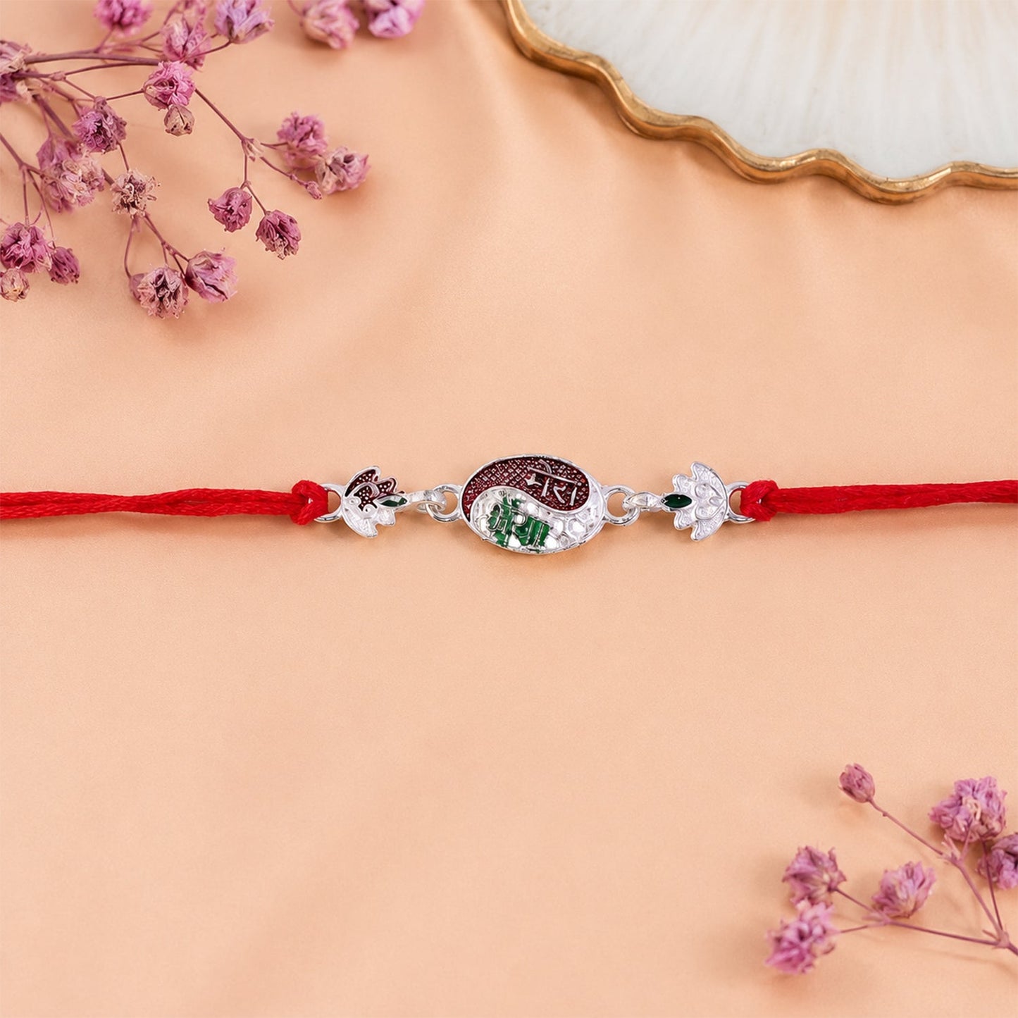 Side profile of the handcrafted Rakhi thread and decorative elements.