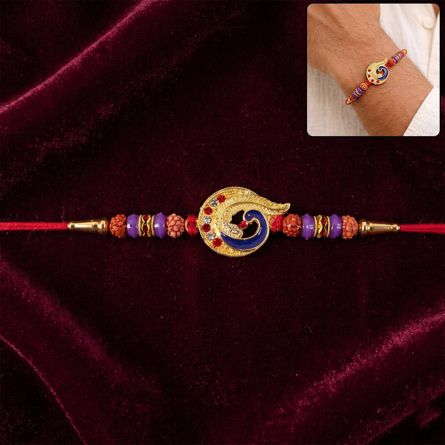 Blue peacock Rakhi for brother with purple beads and a crescent gold frame.